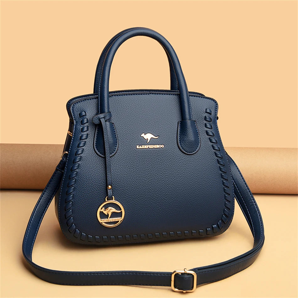 Blue handbag on a beige background